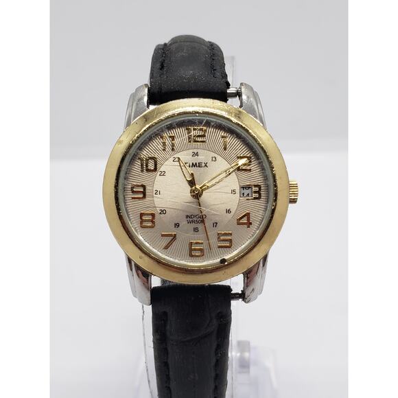 Men's Timex Indiglo watch. Large gold face. CR1216CELL, W7